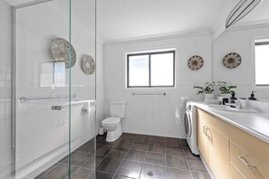 Shower, hair dryer, towels, soap