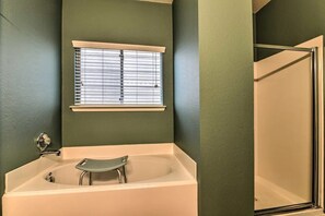 Combined shower/tub, hair dryer, towels, soap