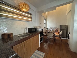 Fridge, stovetop, electric kettle, toaster