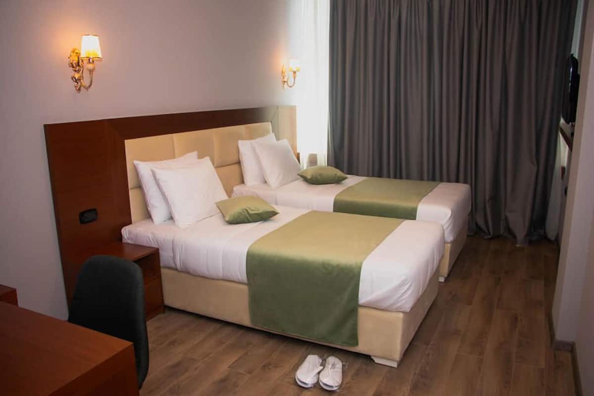 1 habitación, ropa de cama de alta calidad y minibar