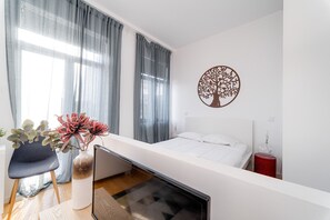 1 غرفة نوم ومكواة/لوح كي وواي فاي مجانًا وملاءات أسرّة