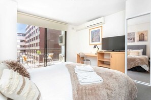 1 dormitorio, tabla de planchar con plancha, wifi gratis y ropa de cama