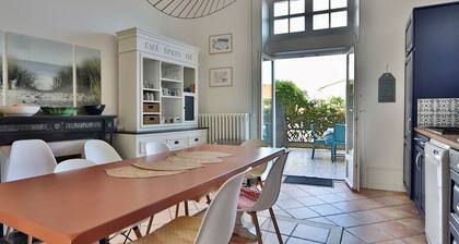 Stunning 5-Bed Home Steps from Beach with Terrace, WiFi, and Game Room