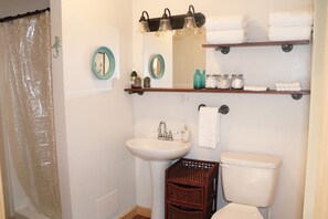 Hair dryer, towels, soap, shampoo