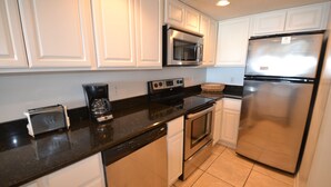 Condo, 3 Bedrooms | Private kitchen - Tropical Winds 104 by Bender Vacation Rentals (Gulf Shores)