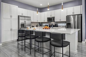 Fridge, microwave, oven, stovetop - Lavish Villa Near Disney w/ Space & Sea Themed BRs, Theater, Arcade & Game Loft (Davenport)