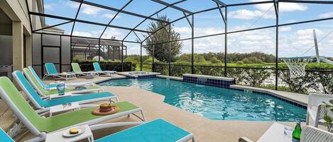 A heated pool, sun loungers