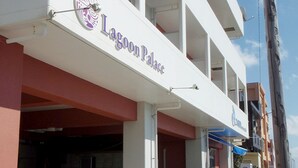 A building with a sign reading "Lagoon Palace". - Lagoon Palace (Kadena)