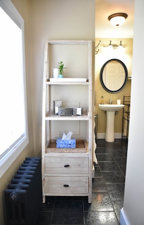 Combined shower/bathtub, hair dryer, towels, soap