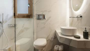 Bathtub, hair dryer, towels, soap