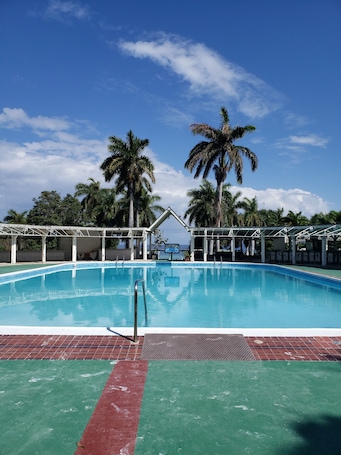 Outdoor pool. Hideaway by the Sea