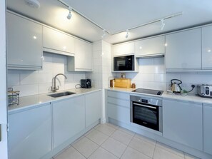 Dishwasher, high chair, cookware/dishes/utensils