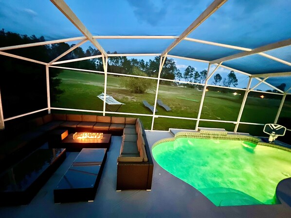 Outdoor pool, a heated pool - 14 room DisneyEstate by AmericanVacationLiving (Davenport)