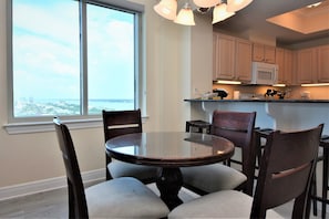 Condo, 2 Bedrooms | Private kitchen | Full-sized fridge, microwave, oven, stovetop - Crystal Tower 1409 by Bender Vacation Rentals (Gulf Shores)