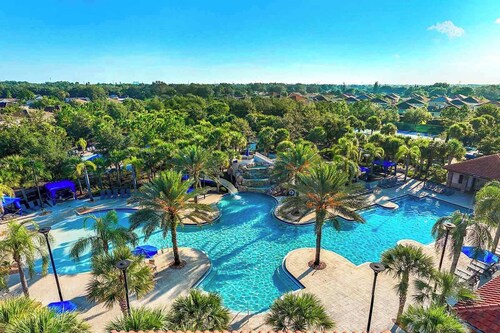 Luxe Villa Near Disney w Dino & Toy Theme BRs, Theater, Arcade, Game Loft & Pool