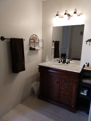 Combined shower/bathtub, hair dryer, towels, soap