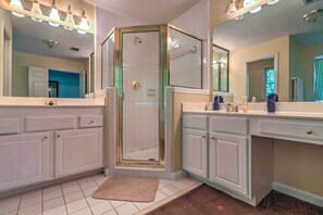 Traditional House | Bathroom | Separate tub and shower, towels, toilet paper