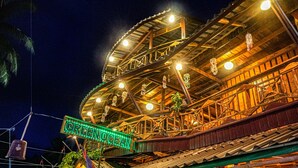 A multi-level wooden structure with a sign reading "GREEN OCEAN." - Green Ocean Koh Rong (Koh Rong)