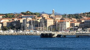 A coastal town with buildings, a marina, and boats. - rental in the gulf of valinco in Propriano (Propriano)