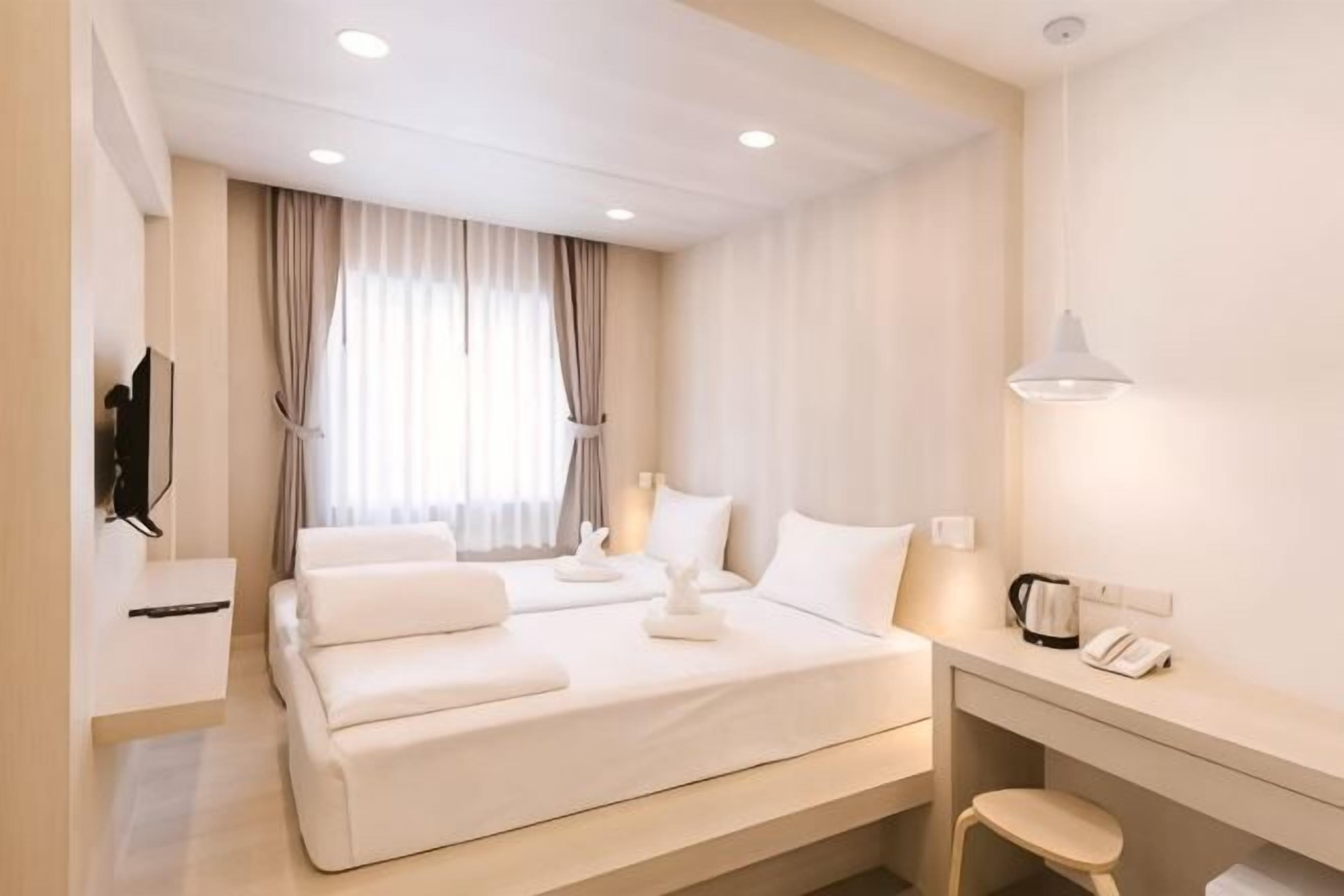 Desk, blackout curtains, free WiFi, bed sheets