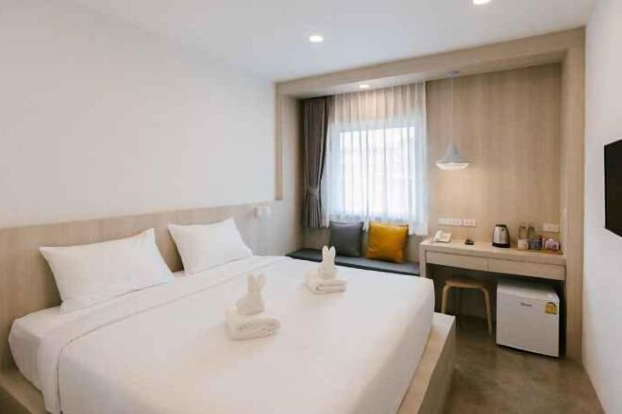 Escrivaninha, cortinas blackout, Wi-Fi de cortesia, roupa de cama