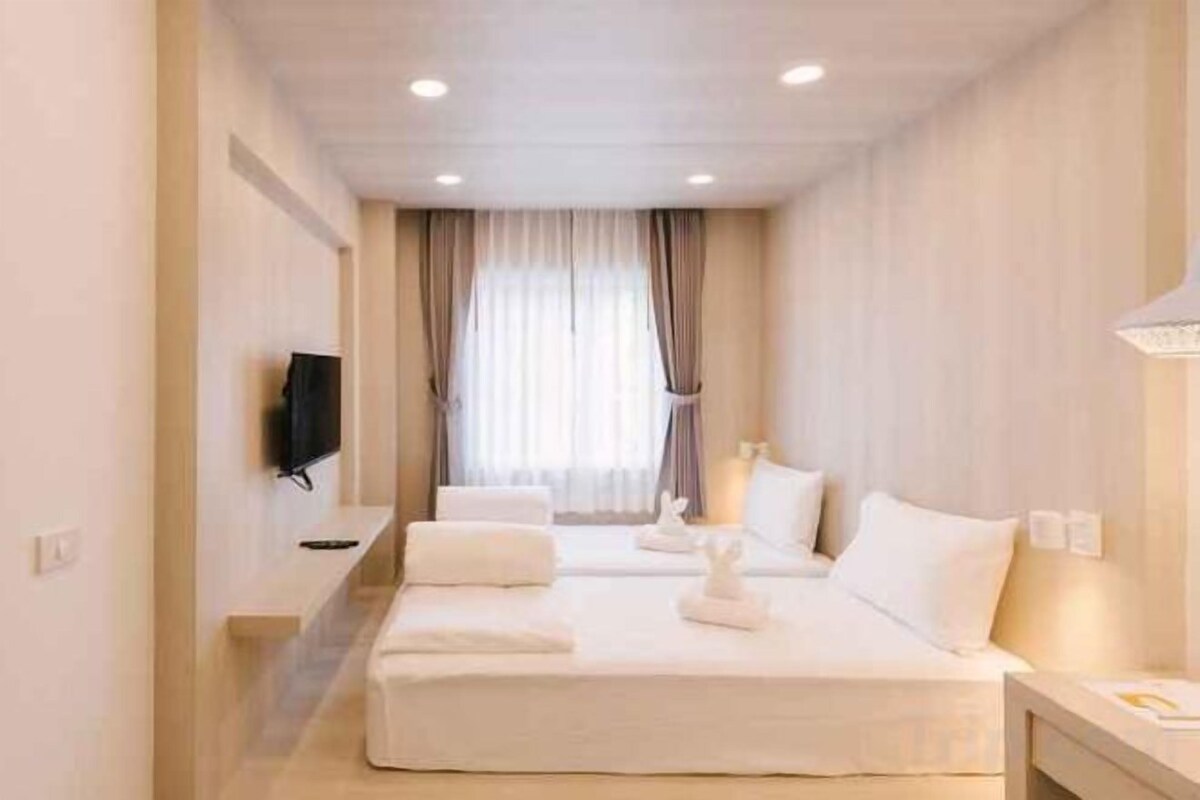 Desk, blackout drapes, WiFi (free), bed sheets