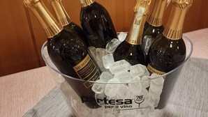 A bucket filled with ice and several bottles of Merlot wine. - La Scardola Ristorante Hotel Bar (Baselga di Pine)