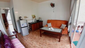 Family Bungalow | Living area | Flat-screen TV - Lotus Apartment (Phu Quoc)