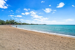 Walking along the beach, guests can enjoy the sound of gentle waves lapping at the shore.