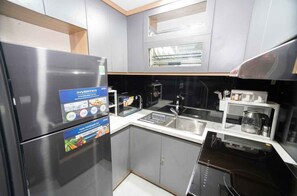 Fridge, microwave, cookware/dishes/utensils, spices