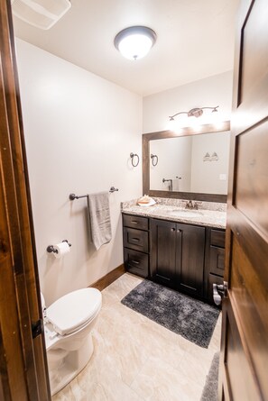 Bathtub, hair dryer, towels, soap