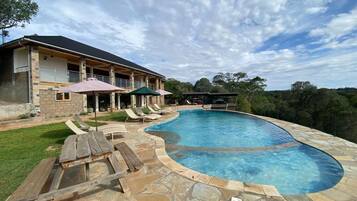 Outdoor pool, pool umbrellas, pool loungers