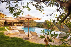 Outdoor pool, pool umbrellas, sun loungers