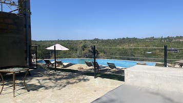 Outdoor pool, pool umbrellas, sun loungers