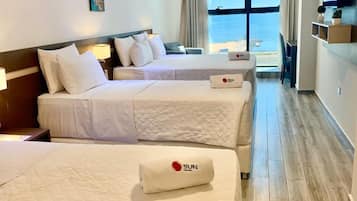Premium bedding, down duvets, Select Comfort beds, minibar