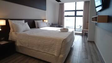 Executive-huone | Ylelliset vuodevaatteet, untuvapeitot