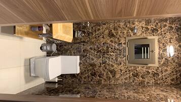 Hair dryer, towels, soap, toilet paper