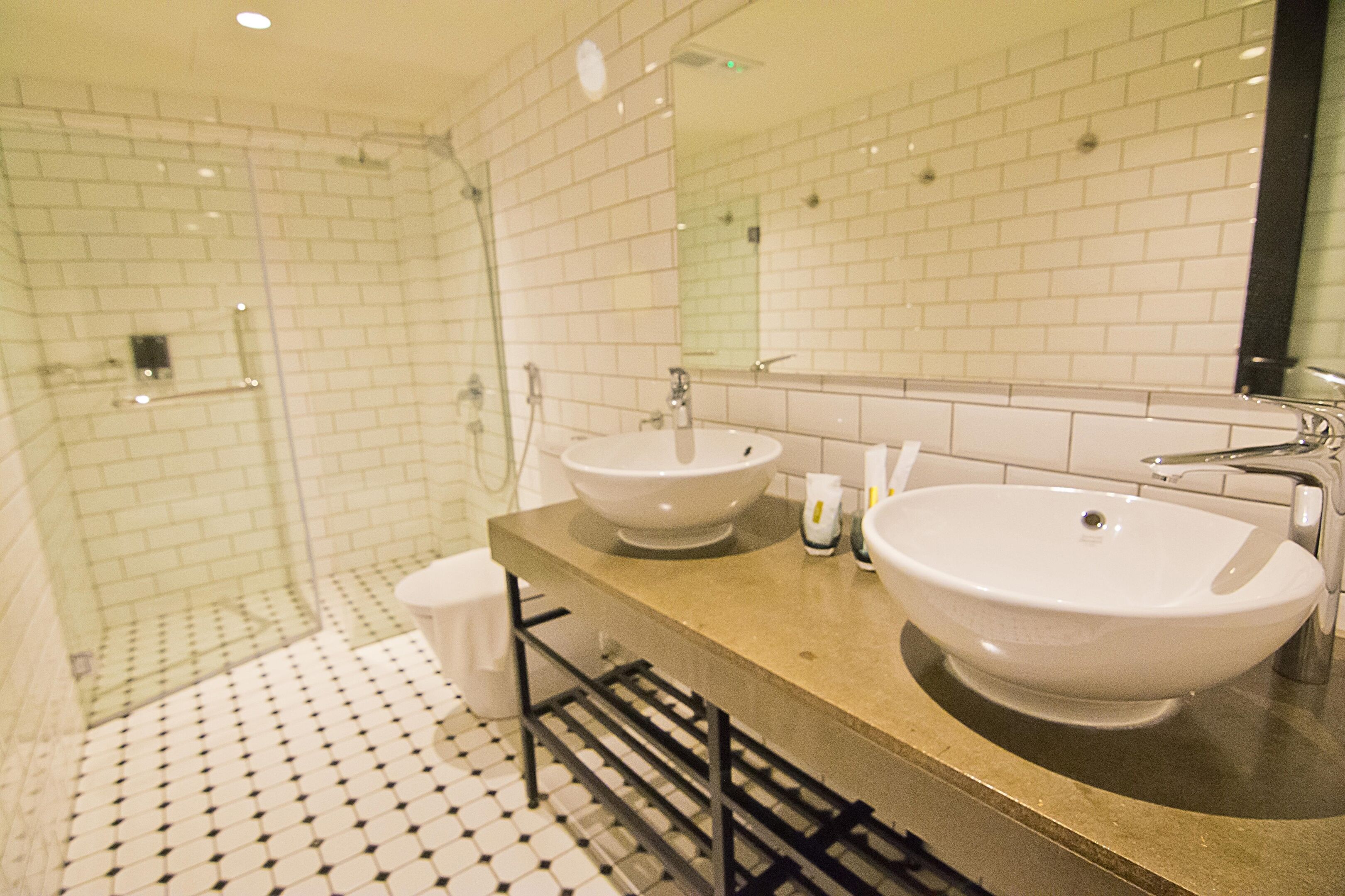 premier double room | bathroom | shower, free toiletries, slippers, towels