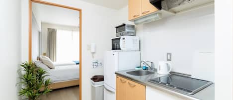 Fridge, microwave, stovetop, cookware/dishes/utensils