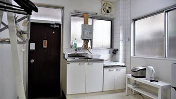 Fridge, microwave, stovetop, cookware/dishes/utensils