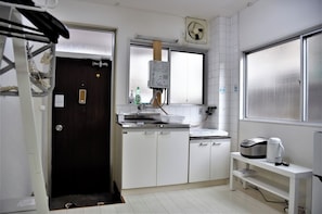 Fridge, microwave, stovetop, cookware/dishes/utensils