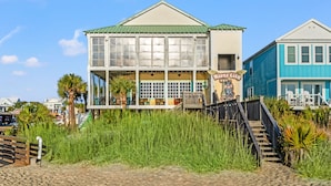 A beachfront building with a green roof, large windows, and a sign reading "Killer City." - 'BIKINI BOTTOM' OCEANSIDE OF BLVD, GREAT VIEWS,POOL, 5 Bedroom, 5 Bathrooms (Surfside Beach)
