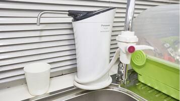 Hårtork, handdukar och schampo