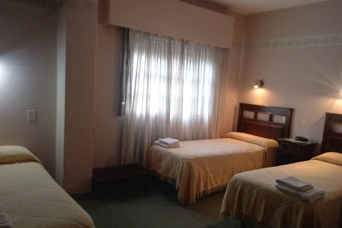 Classic Triple Room, 3 Single Beds | Individually furnished, desk, laptop workspace, free WiFi