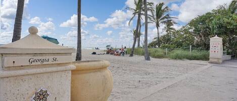 On the beach, sun loungers, beach towels