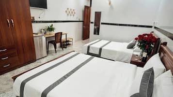 Family Quadruple Room, Balcony | Premium bedding, memory foam beds, minibar, desk