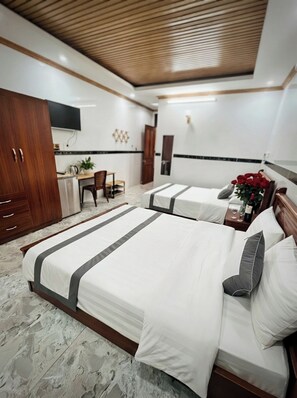 Family Quadruple Room, Balcony | Premium bedding, memory foam beds, minibar, desk - CT Morning Hotel (Can Tho)