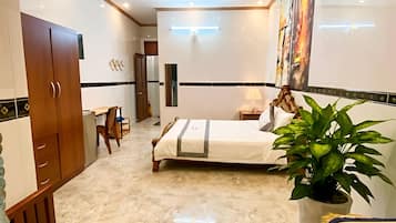 Premium bedding, memory-foam beds, minibar, desk