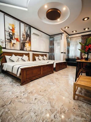 Family Quadruple Room, Balcony | Premium bedding, memory foam beds, minibar, desk - CT Morning Hotel (Can Tho)