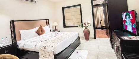 Egyptian cotton sheets, premium bedding, down duvets, minibar